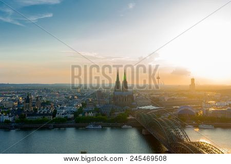 View To The Beautiful City Of Cologne, The Cologne Cathedral, The River Rhine And The Hohenzollern-b