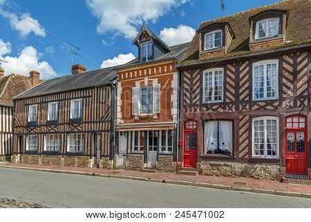 Street With Historical Half-timbered Houses In Beuvron-en-auge, France