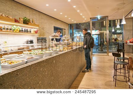 MILAN, ITALY - CIRCA NOVEMBER, 2017: interior shot of Farini in Milan. Farini is modern bakery which offers Italian pastry, salads, bowls and pizza