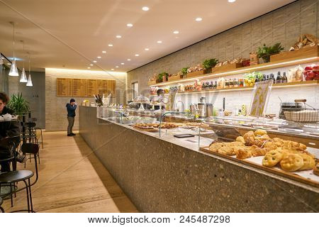MILAN, ITALY - CIRCA NOVEMBER, 2017: interior shot of Farini in Milan. Farini is modern bakery which offers Italian pastry, salads, bowls and pizza