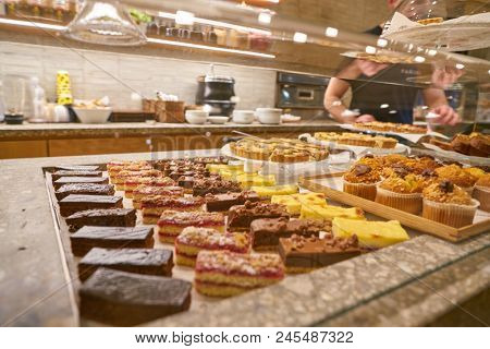 MILAN, ITALY - CIRCA NOVEMBER, 2017: desserts on displya at Farini in Milan. Farini is modern bakery which offers Italian pastry, salads, bowls and pizza