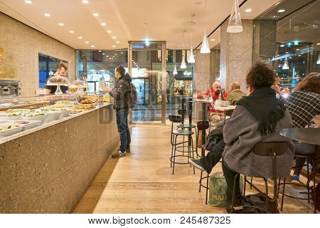 MILAN, ITALY - CIRCA NOVEMBER, 2017: interior shot of Farini in Milan. Farini is modern bakery which offers Italian pastry, salads, bowls and pizza