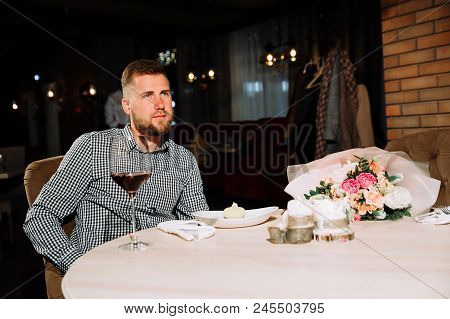 A Man Waiting For His Beloved In A Cafe, Bearded Man Waiting For A Girl On A Date In A Restaurant