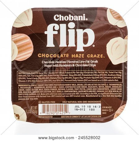 Winneconne, Wi -  13 June 2018: A Package Of Chobani Flip Chocolate Haze Craze Yogurt On An Isolated