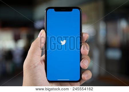 Koh Samui, Thailand - April 15, 2018: Man Hand Holding Iphone X With Social Networking Service Twitt