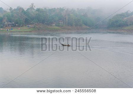 Landscape Of River And Houseboat With Morning Mist
