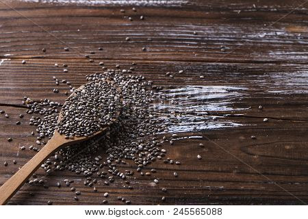 Minimalistic Composition With Chia Seeds On Table. Healthy Nutritious Food.