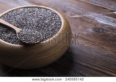 Minimalistic Composition With Chia Seeds On Table. Healthy Nutritious Food.