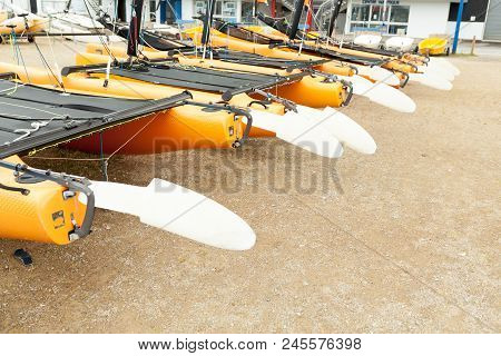 Morgat, France 29 May 2018 Catamarans Storage Without Sails Parked On The Beach.