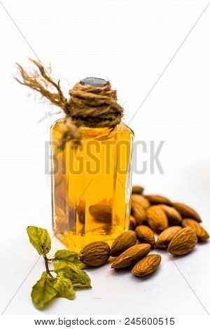 Close Up Of Extracted Oil Of Almond Or Badam Used As Hair Oil For Good And Thicker, Strong Black Hai
