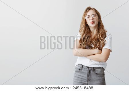Cute Girlfriend Knows Nothing About Manners. Portrait Of Attractive European Female With Childish At