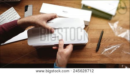 Paris, France - Apr 12 2018: Reading Instructions Whitel Unboxing Unpacking Latest Apple Watch Serie