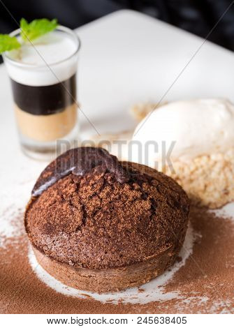 Chocolate Lava Cake Or Molten Chocolate With Fruit And Vanilla Ice Cream.