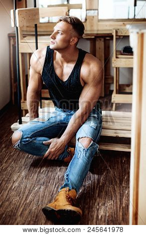 Young Sexy Muscular Man 
In A Studio
