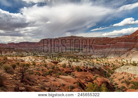 Magnificent Rainbow Layers And A Gorgeous Cloudy Sky In Grand Staircase-escalante National Monument 