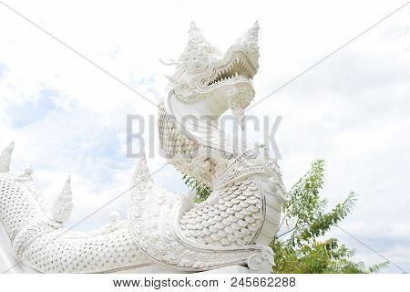 The Wihte  King Of Nagas  At Wat Thung Setthi Templ  In Khonkaen, Thailand.