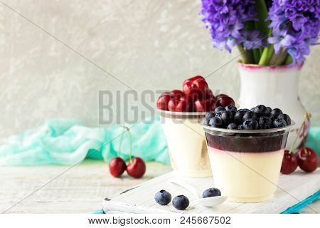 Italian Dessert Pana Cota With Berry Jam And Fresh Blueberries