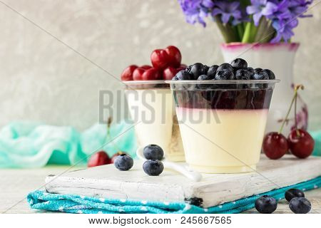 Italian Dessert Pana Cota With Berry Jam And Fresh Blueberries