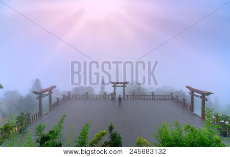 Bao Loc, Vietnam - May 15th, 2018: The Magical Dawn On The Pagoda, Surrounded By Dew And Magical Lig