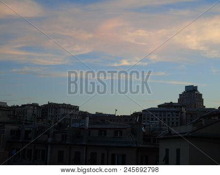 An Amazing Sunset Over The City Of Genova In Spring Days With Some Clouds And Great Reflection Over 