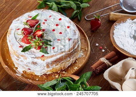 Strawberry Tart Covered With Whipped Sour Cream On A Wooden Tray Over Rustic Background, Close-up, S