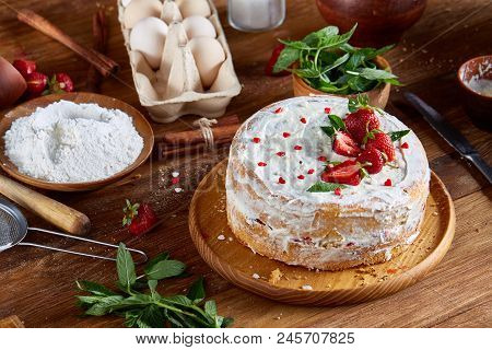 Strawberry Tart Covered With Whipped Sour Cream On A Wooden Tray Over Rustic Background, Close-up, S