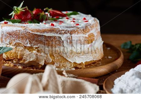 Strawberry Tart Covered With Whipped Sour Cream On A Wooden Tray Over Rustic Background, Close-up, S