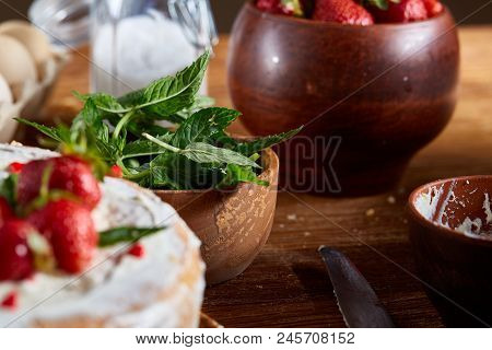 Strawberry Tart Covered With Whipped Sour Cream On A Wooden Tray Over Rustic Background, Close-up, S