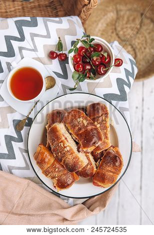 Homemade Baked Croissant With Fresh Garden Cherries