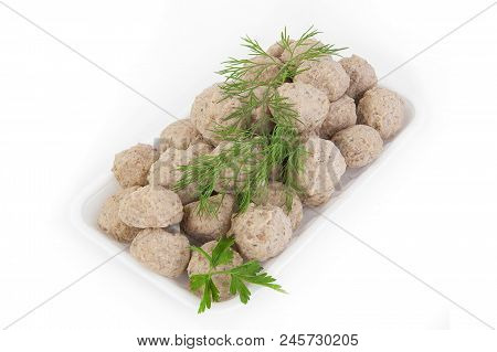 Freshly Frozen Semi-finished Products. Meatballs Of Tender Meat.  Isolate On White Background.
