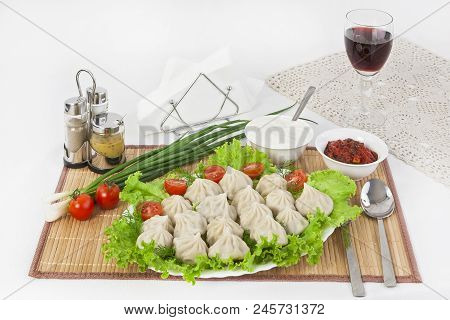 Kinkali In Green With Tomatoes And Onions. Serve With Soy Sauce And Sour Cream.