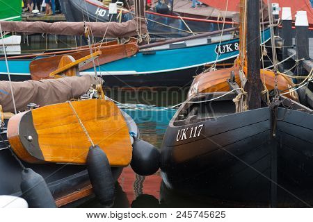 Urk, Netherlands - May 19, 2018: Traditional Wooden Fishing Boats In The Harbor Of Urk. Urk Is On Of