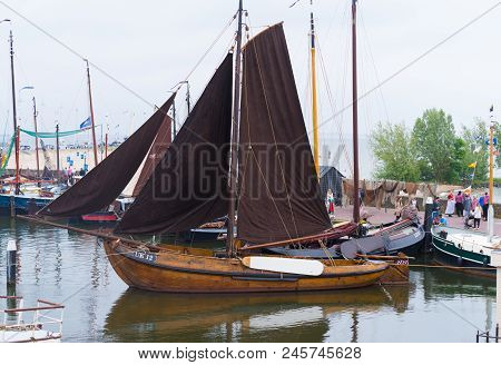 Urk, Netherlands - May 19, 2018: Traditional Wooden Sailboat In The Harbor Of Urk. Urk Is On Of The 