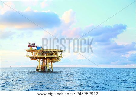 Offshore Construction Platform For Production Oil And Gas. Oil And Gas Industry And Hard Work. Produ