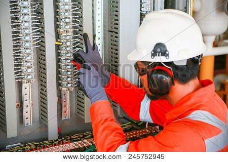 Electrical Terminal In Junction Box And Service By Technician. Electrical Device Install In Control 