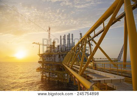 Offshore Construction Platform For Production Oil And Gas. Oil And Gas Industry And Hard Work. Produ