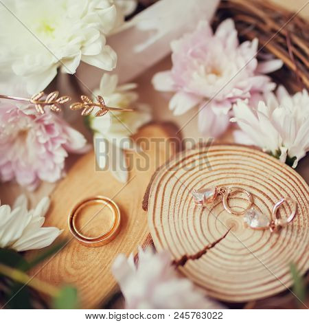 Rusic Style Wedding, Natural Decorations. Wood, Flowers And Wedding Jewelry