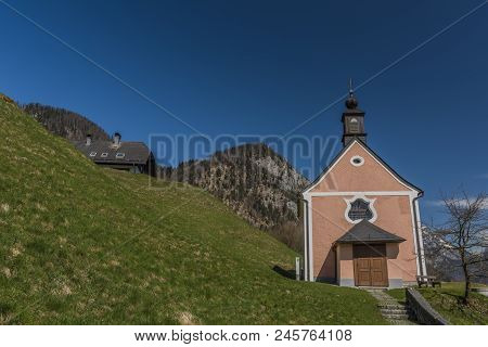 Chapel Over Ebensee Town With Nice Blue Sky And Mountains