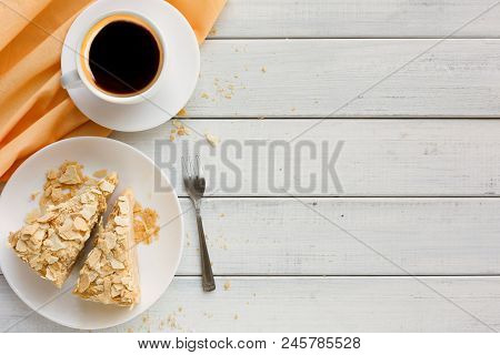 Classic Napoleon Cake With Coffee Cup Top View. Traditional Millefeuille Dessert With Puff Pastry An