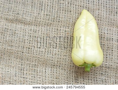 Green Pepper On A Brown Background. Fresh Organic Food. Vegetarianism.