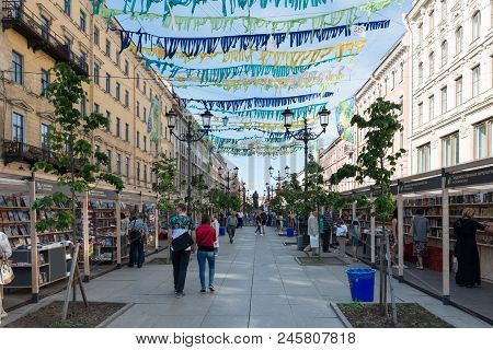 St Petersburg, Russia - 02 June, 2018 Wide Angle Picture Of Pedestrians Walking In A Decorated Stree