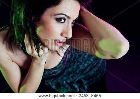Young Caucasian Brunette Dancing. Top View. Studio Shot