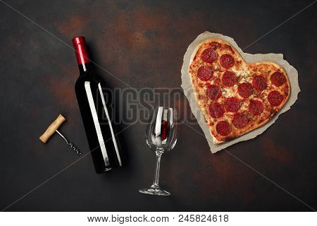 Heart Shaped Pizza With Mozzarella, Sausagered And Wine Bottle, Wineglass And Corkscrew . Valentines