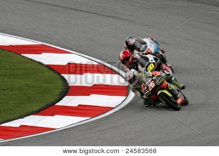 SEPANG, MALAYSIA - 22. oktober: 125cc rytter Adrian martin (26) konkurrerer på kvalificerende session 