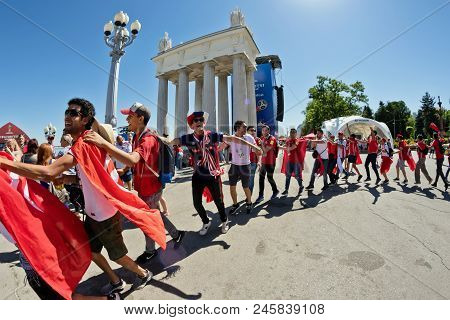 Football Fans Of The National Team Of Tunisia With National Flags And Attributes In Fanzone Fanfesta