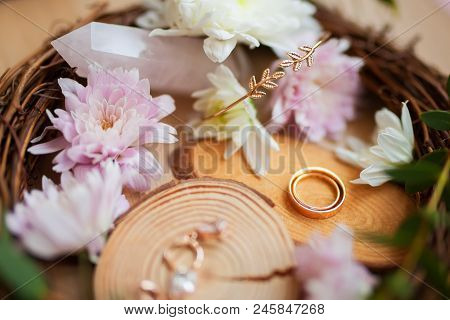 Rusic Style Wedding, Natural Decorations. Wood, Flowers And Wedding Jewelry