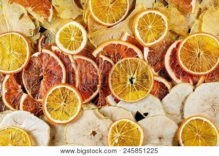 Fruit Chips. Top View Of Dry Slices Of Orange, Grapefruit And Apples.