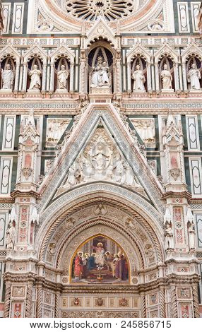 Ornate neo-gothic facade of the Cattedrale di Santa Maria del Fiore or Florence Cathedral (Il Duomo di Firenze), a famous UNESCO World Heritage Site and a major tourist attraction of Tuscany Italy