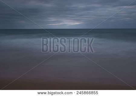 Early Morning At An Australian Beach Alongside The Iconic Great Ocean Road (long Exposure Of The Sur