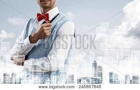 Double Exposure Of Confident And Young Businessman In Smart-casual Wear Smoking Pipe And Modern City